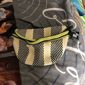Ugg Fanny pack. Medium size. Neon green, yellow, black striped and tan colors.